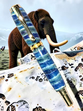 Cargar imagen en el visor de la galería, Woolly mammoth molar rollerball pen with rhodium and gold accents, clip view